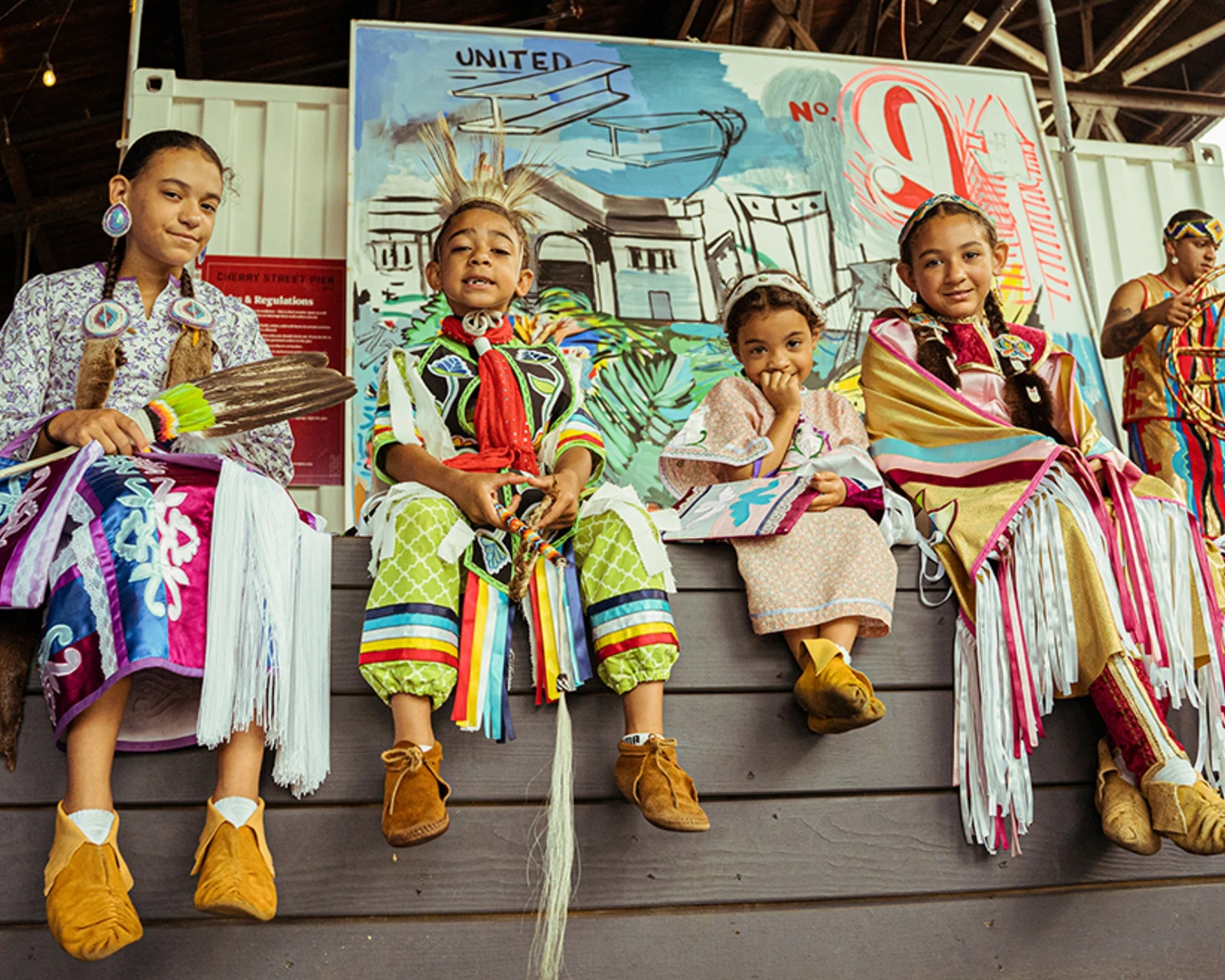 We Are the Seeds' 2021 arts and culture festival at Cherry Street Pier in Philadelphia, where they shared Lenape culture through dance, song, and storytelling. Pictured: Red Blanket Singers highlighting Chief Urie Ridgeway’s family. Photo by Max McDonald.
