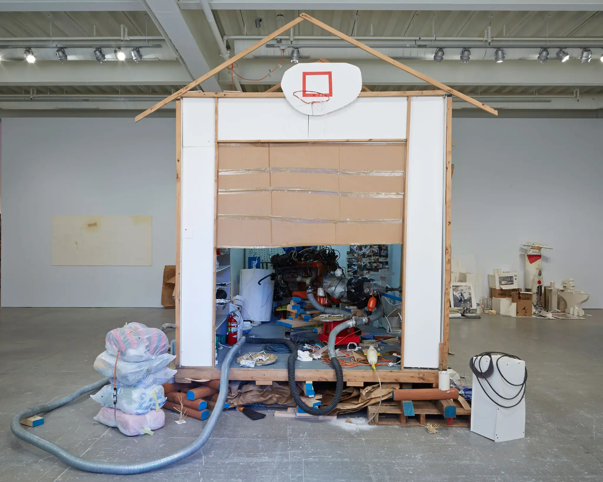 Jason Rhoades, Garage Renovation New York (CHERRY Makita), 1993, installation view, Institute of Contemporary Art, University of Pennsylvania. Photo: Aaron Igler/Greenhouse Media.