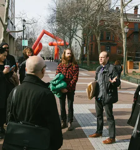 Curator Daniel Tucker leads a group tour of historian Brad Duncan&rsquo;s self-determination archives. Photo by Paul Gargagliano of Hazel Photo, Courtesy of Daniel Tucker.