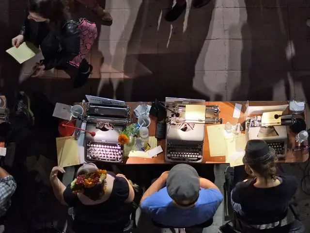 A &ldquo;Poetry Bureau,&rdquo; created by the Center for the Art of Performance at UCLA, Westwood Village, 2013. Featuring a group of volunteer poets who write a spontaneous verse for visitors, the bureau appears outside the theater prior to a related performance. Photo by Phinn Sriployrung&nbsp;