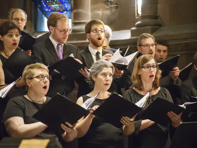 Members of Choral Arts Philadelphia during a pre-concert warm-up, alto and bass section. Photo by Sharon Torello.