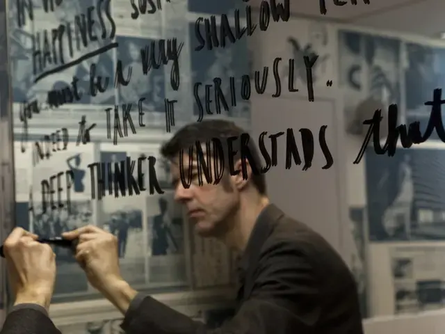 Stefan Sagmeister, working on a display for The Happy Show. Image courtesy of the Institute of Contemporary Art, University of Pennsylvania.