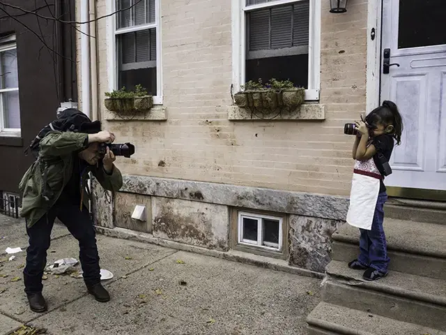 Will Steacy and Layla Perea photographed each other in November, 2015, for the Philly Block Project. Steacy is one of the collaborating artists for the Philly Block Project and Perea is a South Kensington resident. Photo by Jordan Baumgarten/Philly Block Project, 2015.