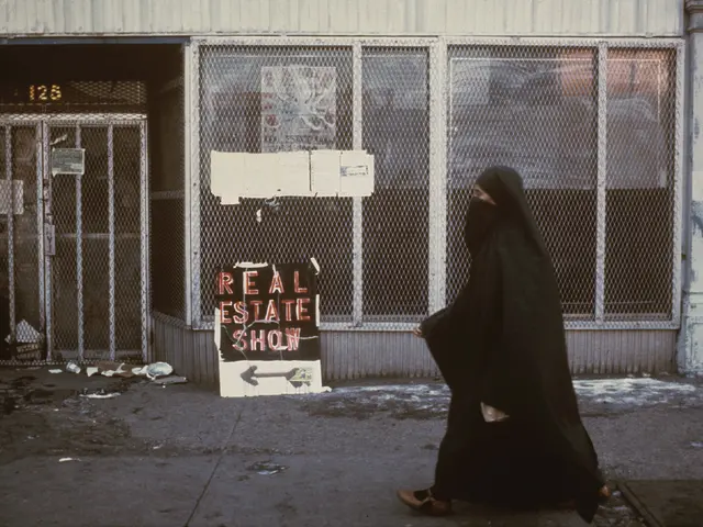 Passerby at 125 Delancey Street, site of The Real Estate Show. Photo by Anne Messner.