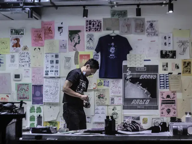 Artist Jeffrey Cheung installs the Unity at the Initiative exhibition, 2021, Asian Arts Initiative. Photo by Zsa Zsa Dali.