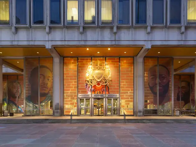 Russell Craig and Jesse Krimes, Portraits of Justice, 2018, Municipal Services Building, Philadelphia, PA. Photo by Steve Weinik, courtesy of Mural Arts Philadelphia.