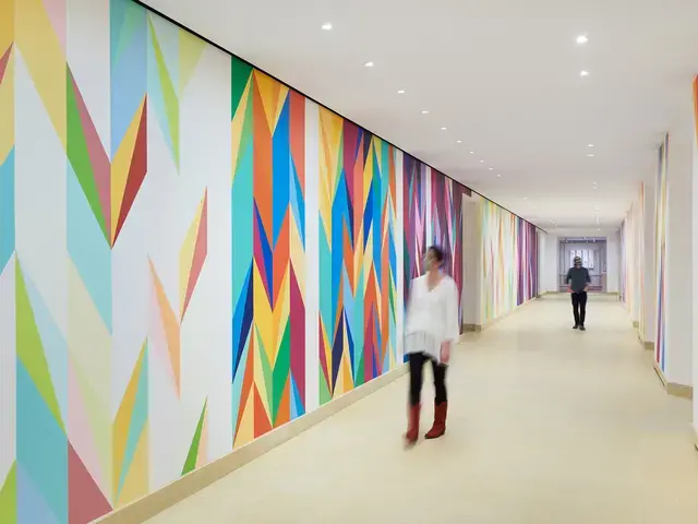 Odili Donald Odita, Walls of Change, 2021; acrylic latex paint on wall, 128’. Commissioned by the Philadelphia Museum of Art with funds contributed by John Alchin and Hal Marryatt. Courtesy of the artist and Jack Shainman Gallery. Image courtesy of the artist and the Philadelphia Museum of Art.&nbsp;