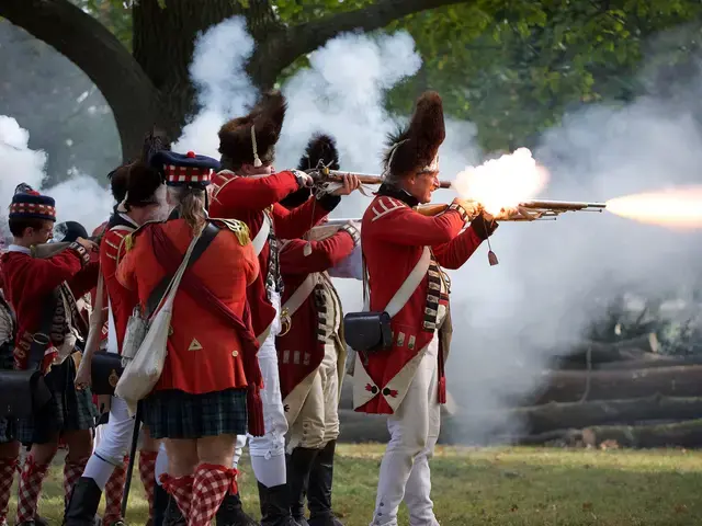 British soldiers firing on the Continental troops during the 2017 re-enactment of the Battle of Germantown. Photo by Garth Herrick.&nbsp;