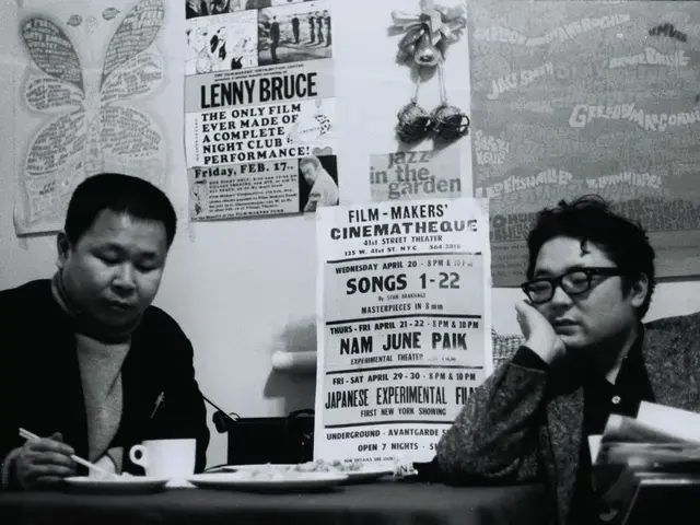 Jūshin Satō and Takahiko Iimura at Filmmakers Cooperative. Photographer unknown, courtesy of Japan America Society for Greater Philadelphia.