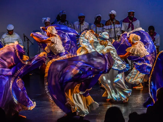 Kùlú Mèlé African Dance and Drum Ensemble performing Yemaya, 2014. Photo by Jaci Downs.