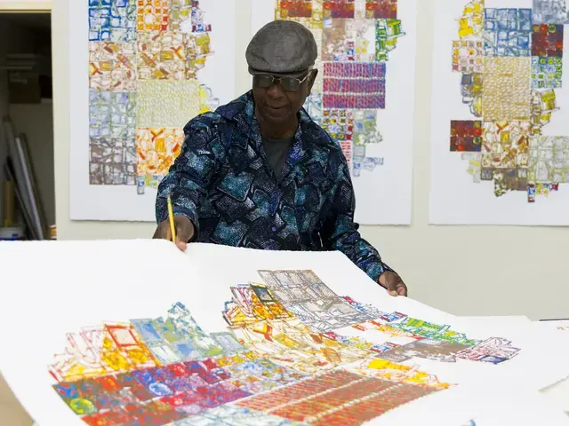 Artist El Anatsui signing prints made with Brandywine Workshop and Archives staff and affiliated master printer Alexis Nutini. Brandywine’s PrintLab supports eight artists in a creative residency to explore emerging printmaking techniques and technologies. Photo by Gustavo Garcia.