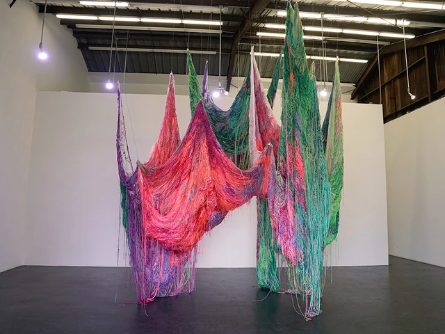 Carmen Mardonez, I dare, textile installation, 30 discarded bed sheets hand embroidered, 2022. Photo by Carmen Mardonez.&nbsp;