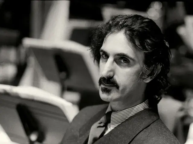 Frank Zappa at The Barbican, London, 1982. Photo by Michael Putland.