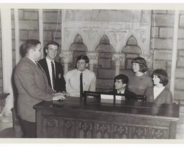 Dr. Fryer with group at organ, 1967. John Fryer papers [3465]. Courtesy of the Historical Society of Pennsylvania.