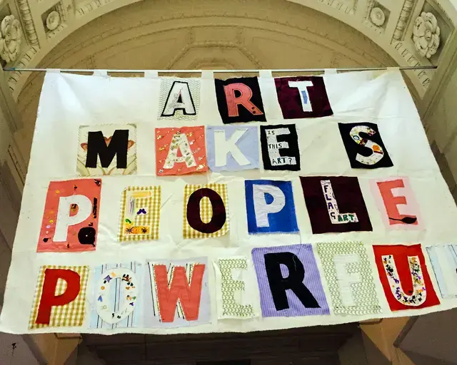 Bob and Roberta Smith, Art Makes People Powerful (2013). Fabric with applique and embroidery. Courtesy of the artist and Pierogi Gallery.