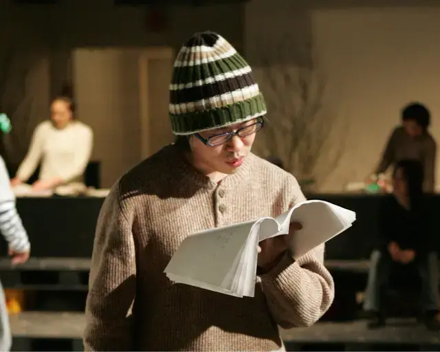 Toshiki Okada at work. Photo courtesy of Pig Iron Theatre Company.