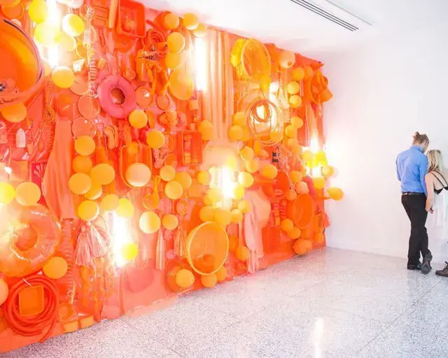 Melanie Smith,&nbsp;Orange Lush,&nbsp;1995/2015, installation view of Strange Currencies, The Galleries at Moore. Photo by Kait Privitera.