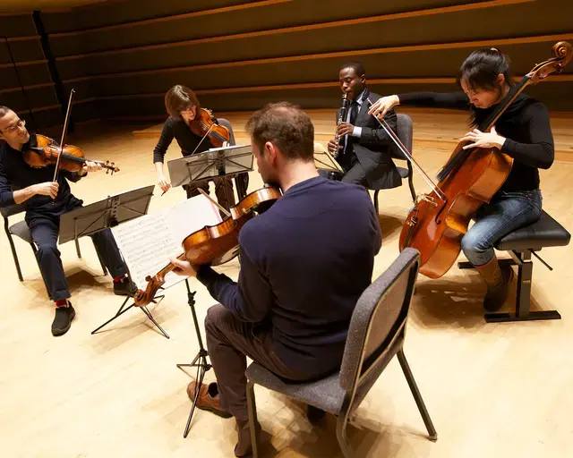 Clarinetist Anthony McGill and the Brentano Quartet perform during an open rehearsal. Photo by Langdon Photography. Courtesy of the Philadelphia Chamber Music Society.