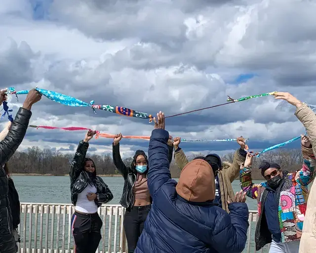 Participants make a fabric circle during a Circle Keepers gathering for Swarthmore College’s Rosine Association 2.0 project, 2022, The Discovery Center, Philadelphia, PA. Photo by Sophia Becker.