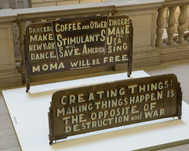 Bob and Roberta Smith, MoMA WILL BE FREE (2011) and CREATING THINGS (2011), installed as part of Framing Fraktur at the Free Library of Philadelphia. Courtesy of the Free Library of Philadelphia.