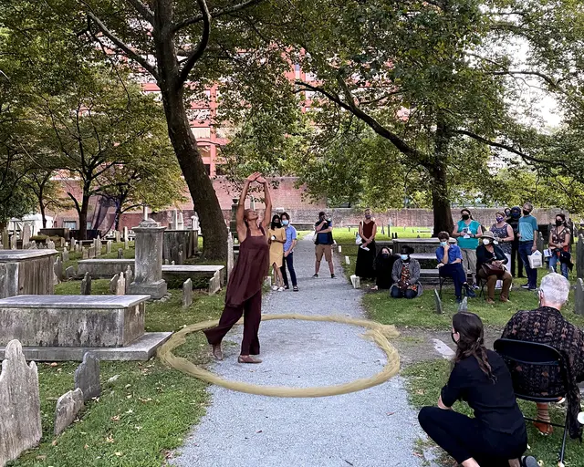 Shayla-Vie Jenkins performs in the Christ Church Burial Ground.