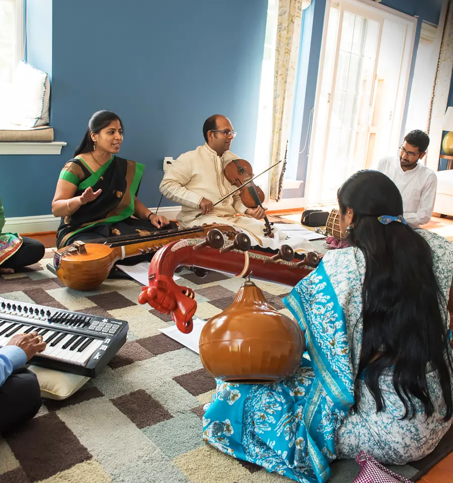 Artists N Muralikrishnan (Keyboard), Shruthi Rajasekar (Tambura), Kiranavali Vidyasankar (Voice &amp; Chitravina), V V S Murari (Violin), Akshay Anantapadmanabhan (Kanjira &amp; Konnakkol), Ravi Balasubramanian (Ghatam), Prasant Radhakrishnan (Saxophone) &amp; Nirmala Rajasekar (Vina) during rehearsals for Tradition &ndash; An Evolving Continuum. Photo by Nan Melville.