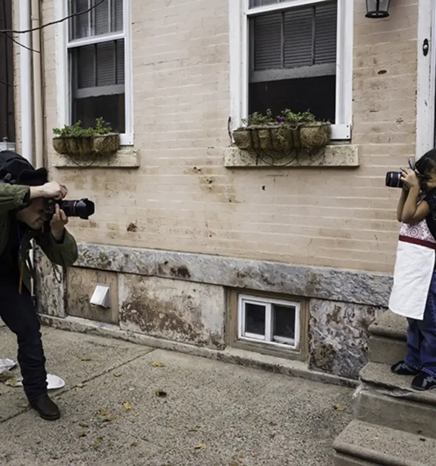 Will Steacy and Layla Perea photographed each other in November, 2015, for the Philly Block Project. Steacy is one of the collaborating artists for the Philly Block Project and Perea is a South Kensington resident. Photo by Jordan Baumgarten/Philly Block Project, 2015.