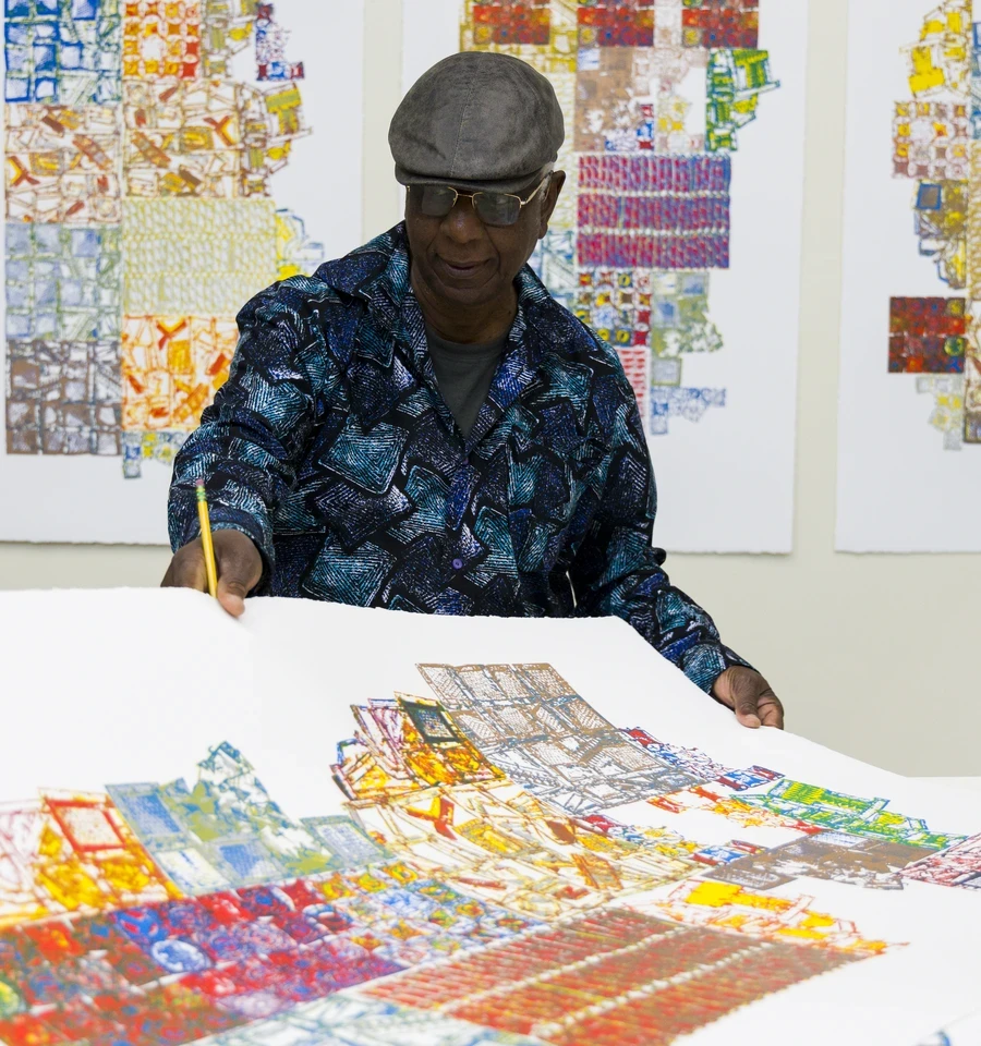 Artist El Anatsui signing prints made with Brandywine Workshop and Archives staff and affiliated master printer Alexis Nutini. Brandywine’s PrintLab supports eight artists in a creative residency to explore emerging printmaking techniques and technologies. Photo by Gustavo Garcia.
