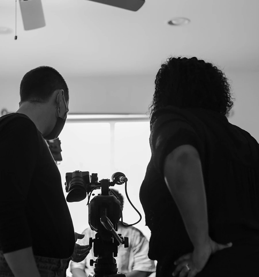 Pew Fellow Jos Duncan Asé (right) and cinematographer Marie Hinson behind the scenes on set of Queen Mother: Falaka Fattah & The House of Umoja film shoot. Photo by Tezarah Wilkins.