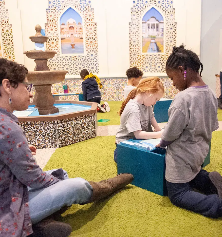 Please Touch Museum, America to Zanzibar, exhibit courtyard and fountain filled with visitors’ shared wishes for the world. Photo courtesy of the Please Touch Museum.