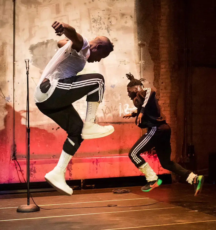 University of the Arts School of Dance, Nora Chipaumire, "#PUNK"&nbsp;performance shot. Pictured: Nora Chipaumire and Shamar Watt. Photo by Ian Douglas.